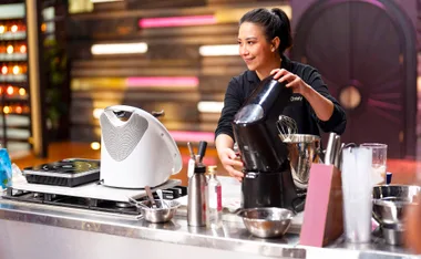 Christy Tania is preparing a dessert in the kitchen on Dessert Masters.