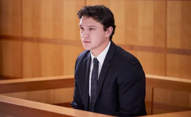 Perri looks nervous as he takes the stand in court over the killing of his father.