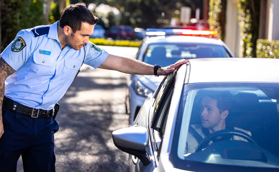 Cash (Nicholas Cartwright) confronts Tim and Eden after pulling them over on the highway.