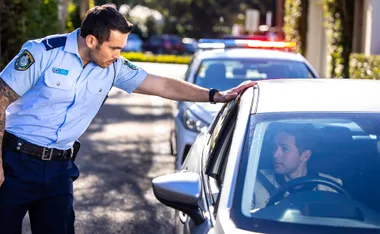 Cash (Nicholas Cartwright) confronts Tim and Eden after pulling them over on the highway.