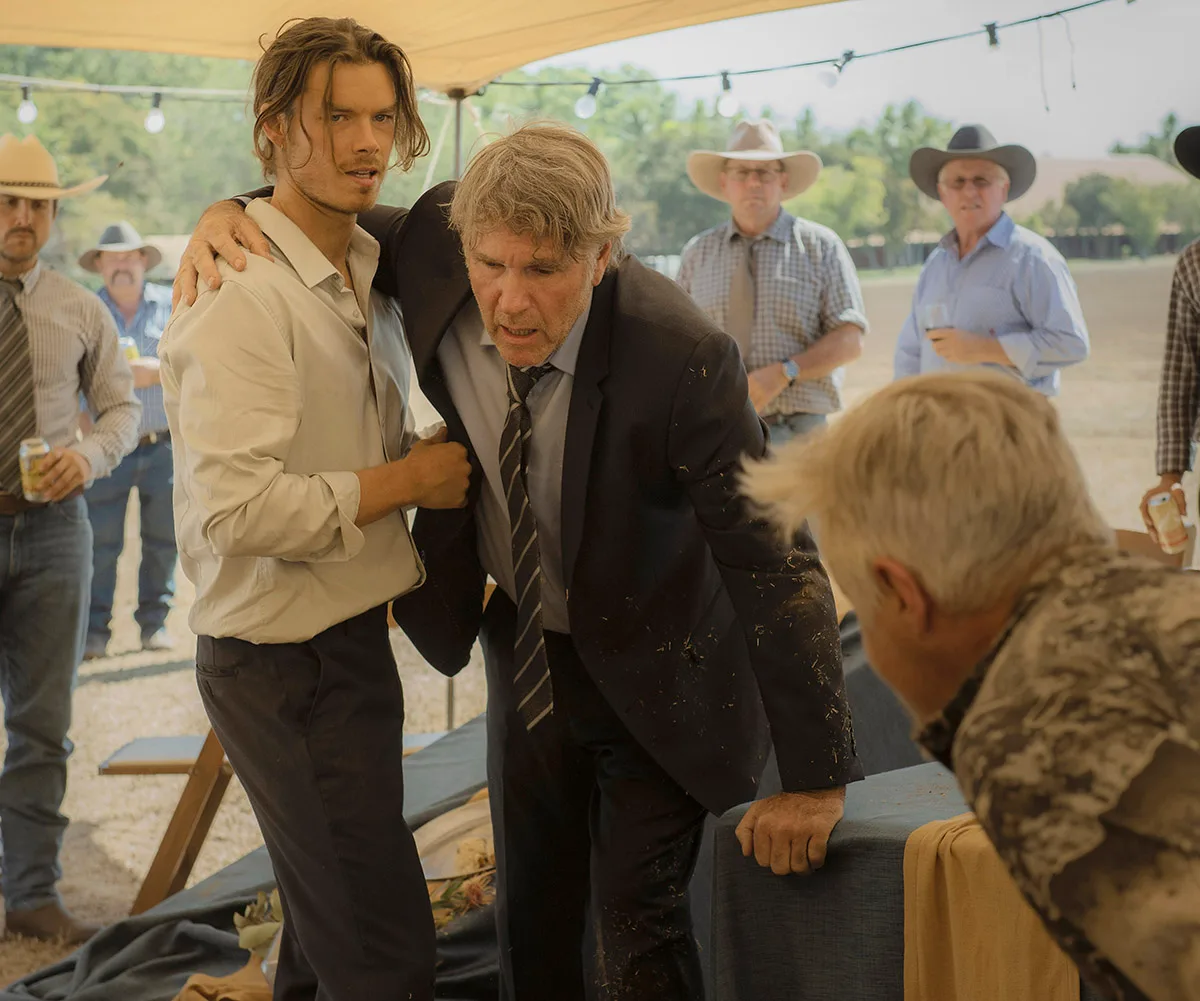 A fight breaks out between Colin (centre) and Hank (Dan Wylie, far right), Emily's brother, at Daniel's wake