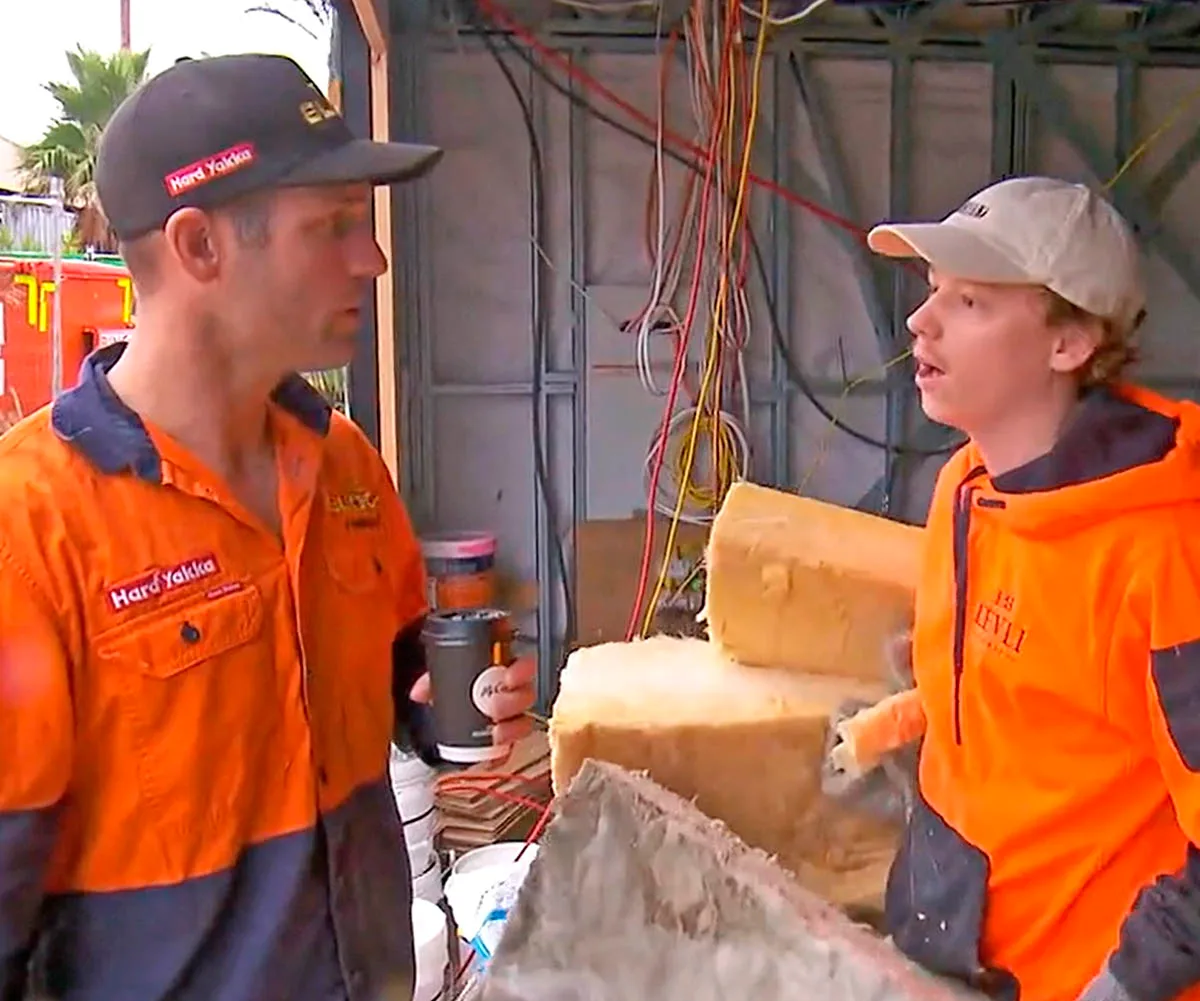 Foreman Dan instructs Maddy and Charlotte's brother Jack to stop helping while on site both wearing caps and orange hi vis