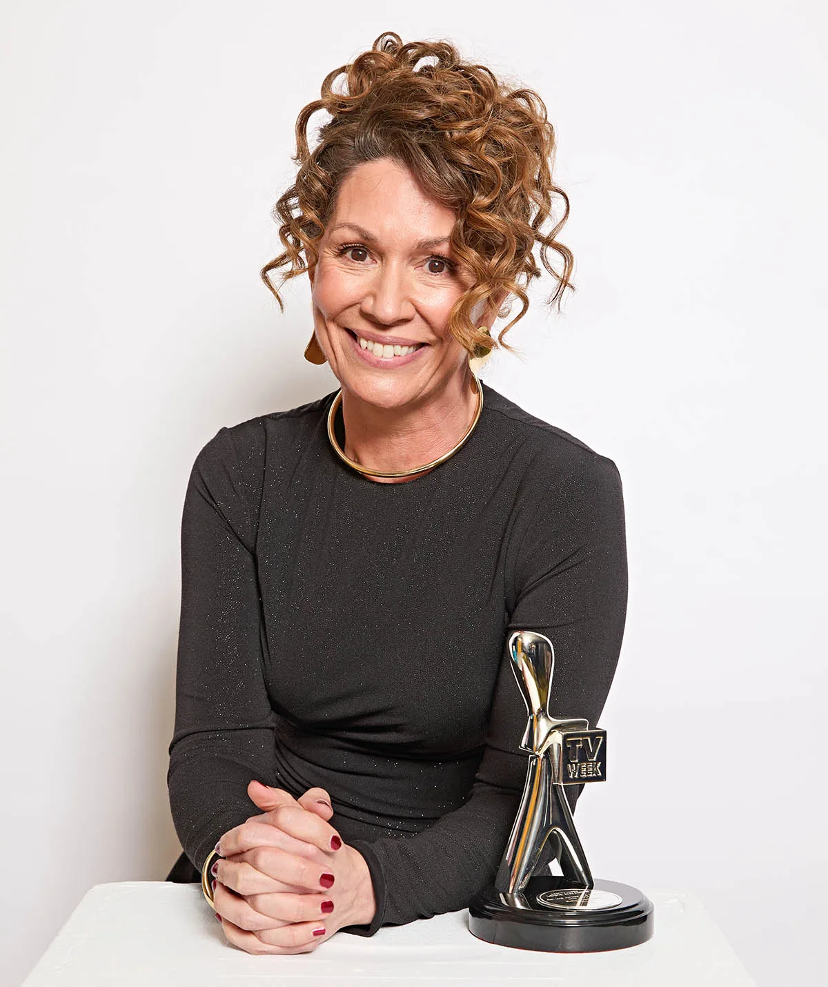 Kitty poses with a Logie Award from the 2024 TV WEEK Logie Awards