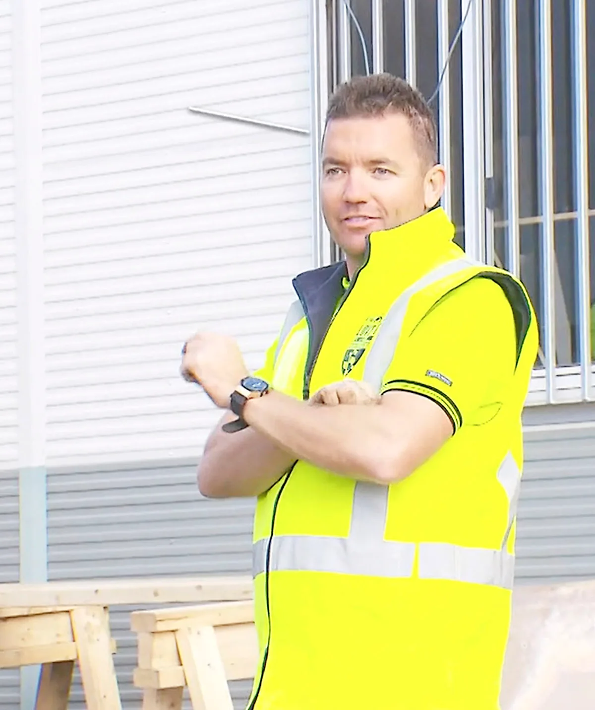 Troy Lovett on site in yellow hi vis