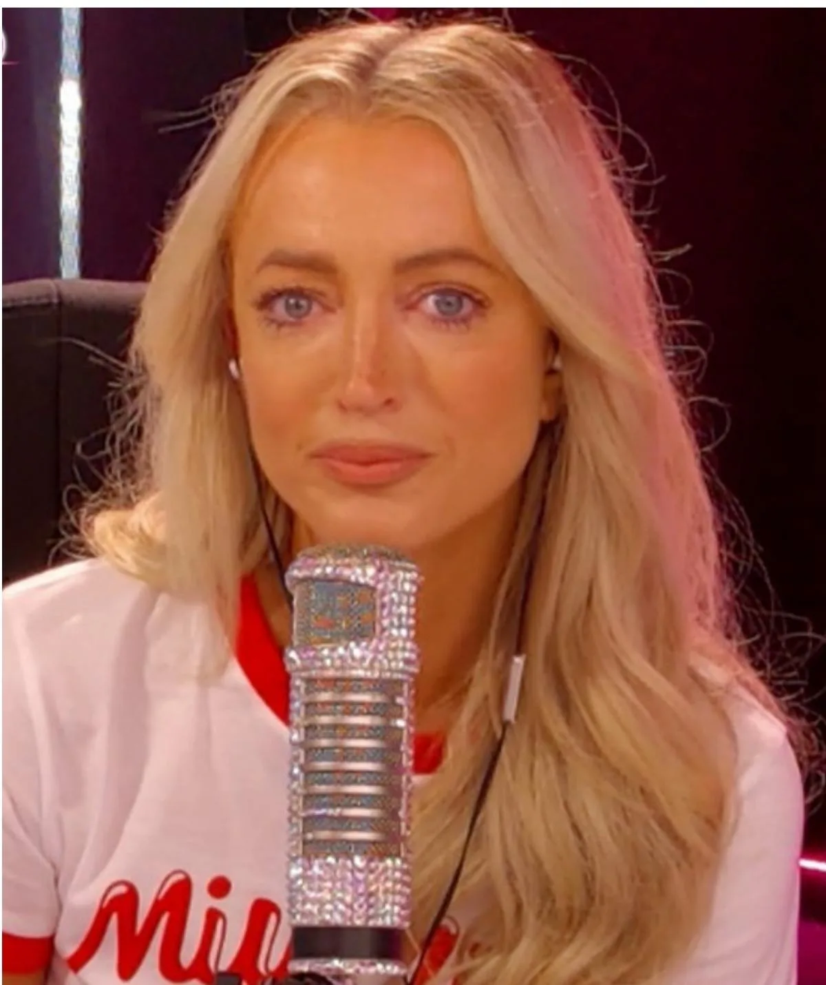 Jackie O with a microphone