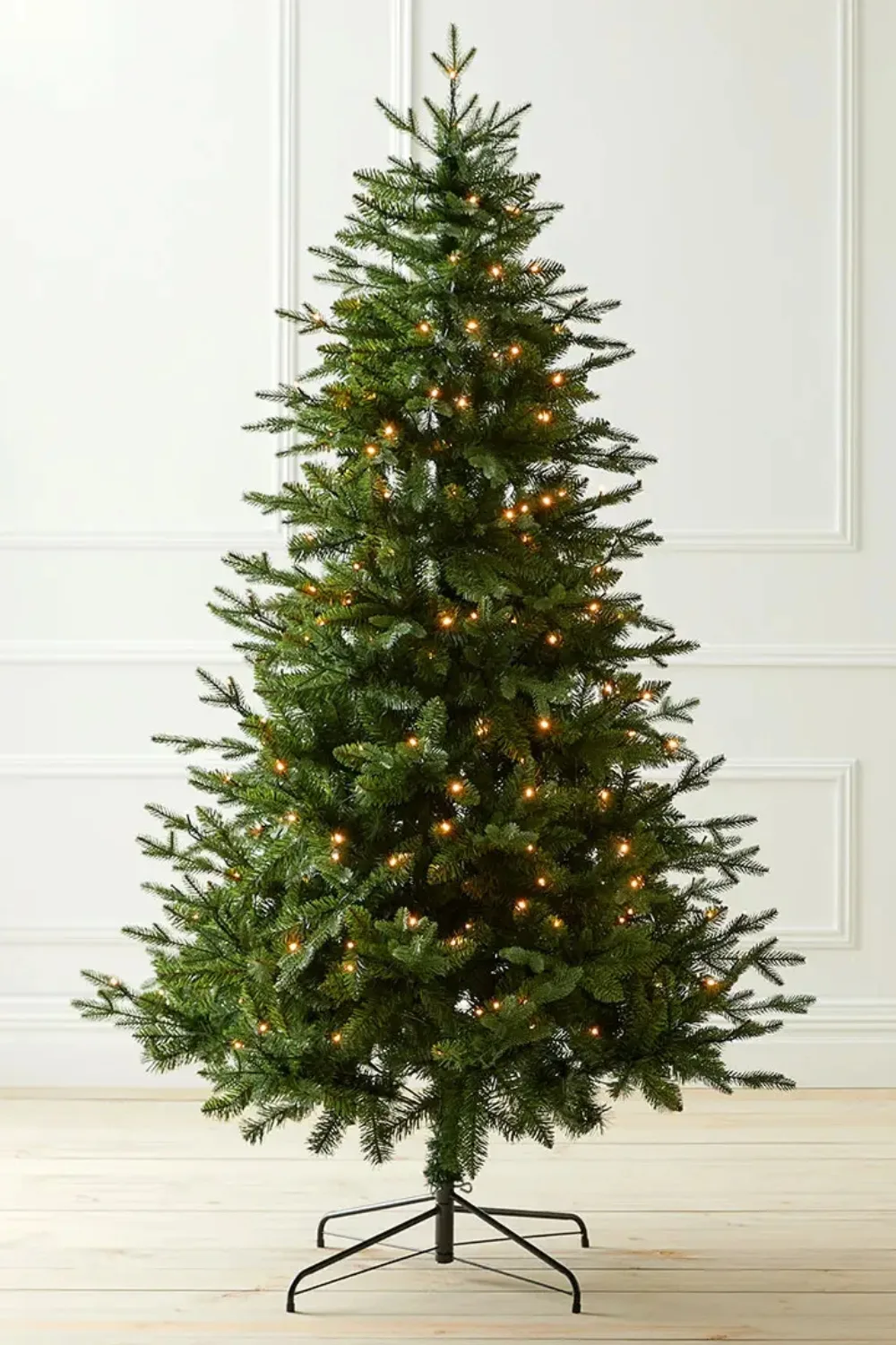 A festive Pre Lit 7ft Artificial Christmas Tree in Green, featured in Black Friday sales.