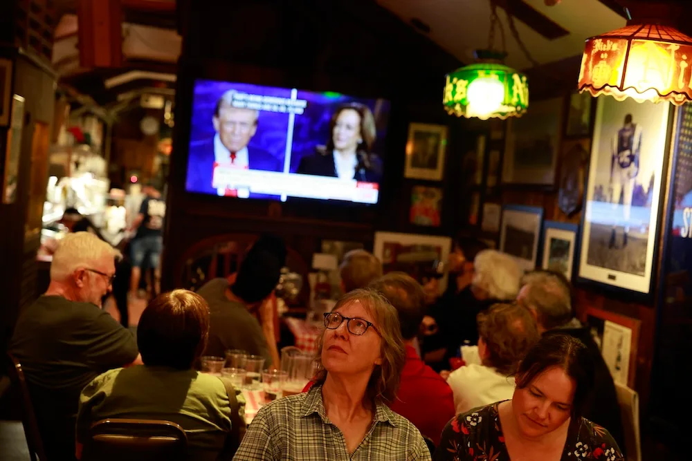 People watching Harris and Trump on TV