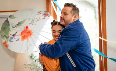 Toadie hugs a smiling Nell as she celebrates her 16th birthday