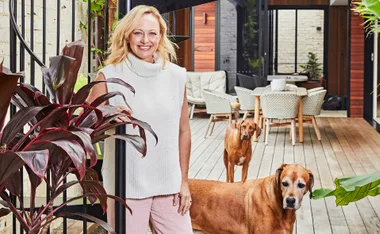 The Block's Shelley Craft stands with her dog at her home.