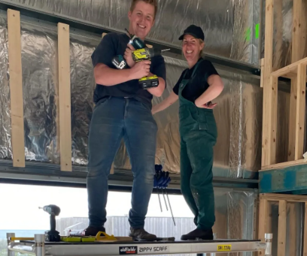 Caz and Fergus using tools to build their restaurant