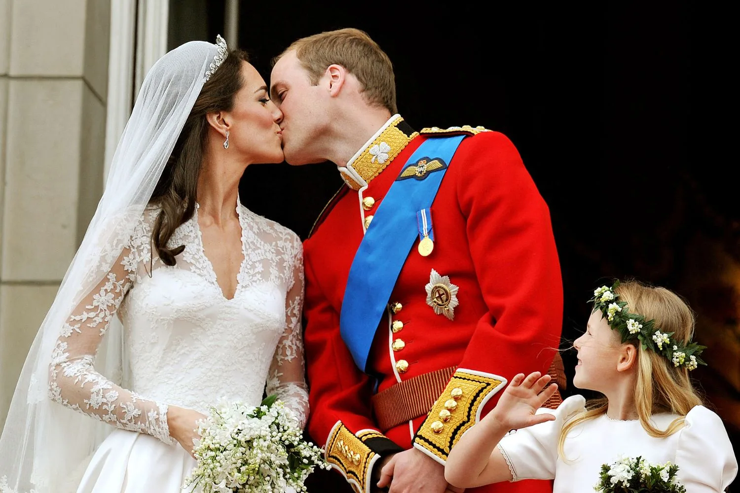 Kate in wedding dress and Will in royal wear 