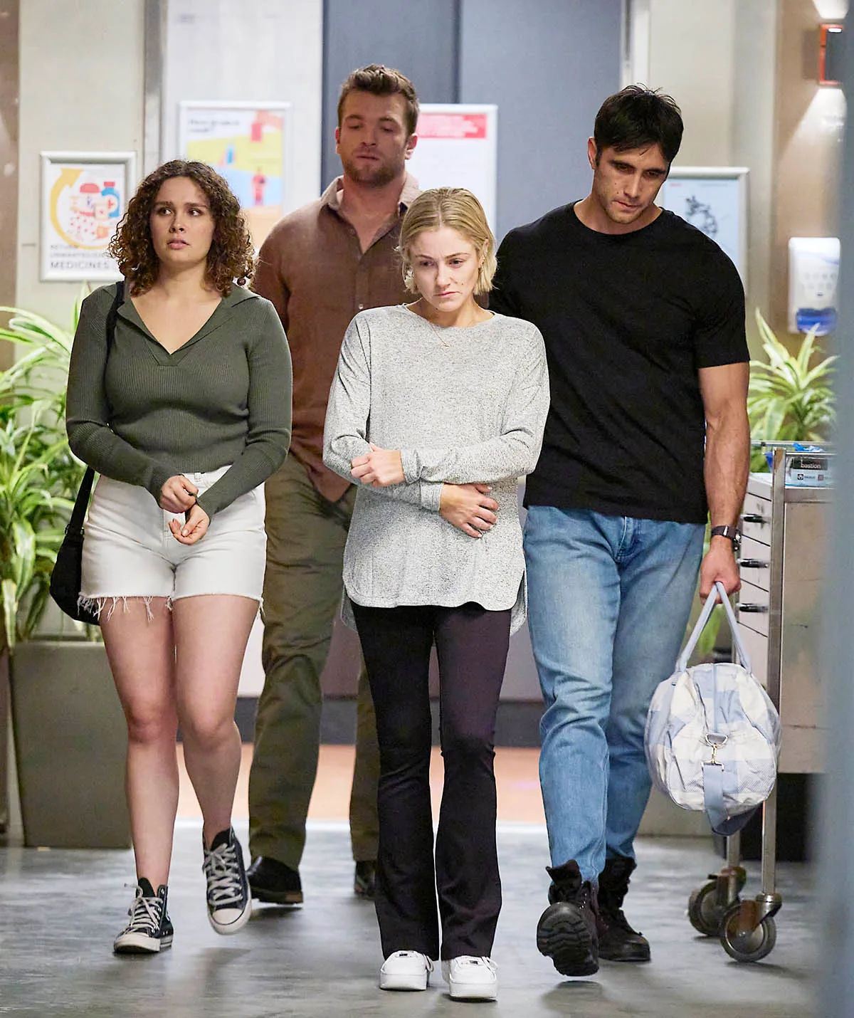 Harper is consoled by Dana, Levi and Tane as she leaves the hospital