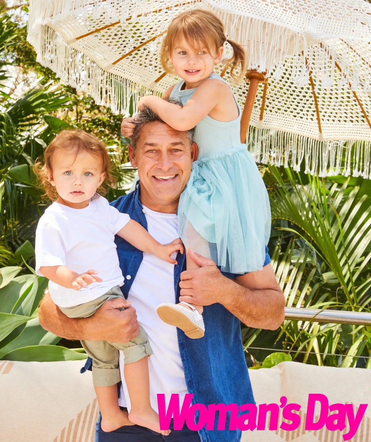 Jamie Durie holds his children Beau and Nash. 