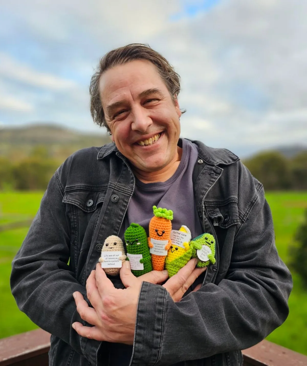 Samuel Johnson with his crochet vegetables