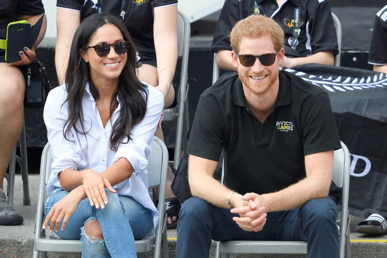 Harry and Meghan watching a match