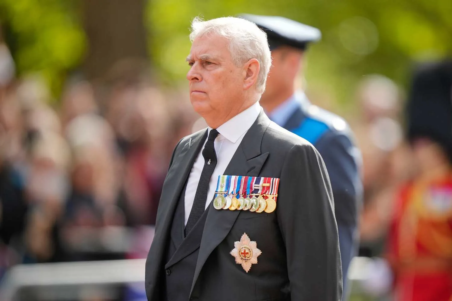 Prince Andrew with military badges 