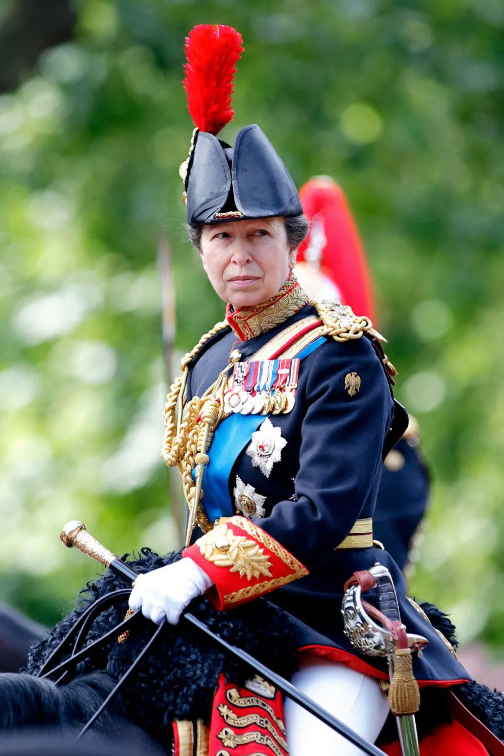 Princess Anne in uniform on horseback