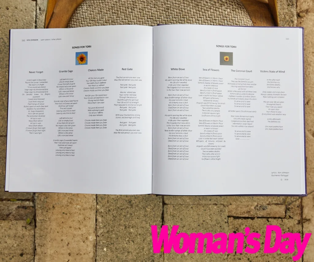 An open book filled with song lyrics.