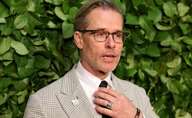 Neighbours star Guy Pearce sparks wedding rumours with partner of nine years, Carice van Houten