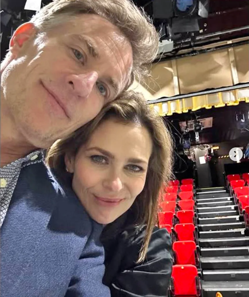 Kat snuggles up to husband David Whiteley