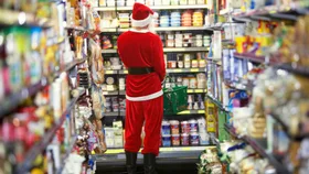 Santa Clause shopping in supermarket