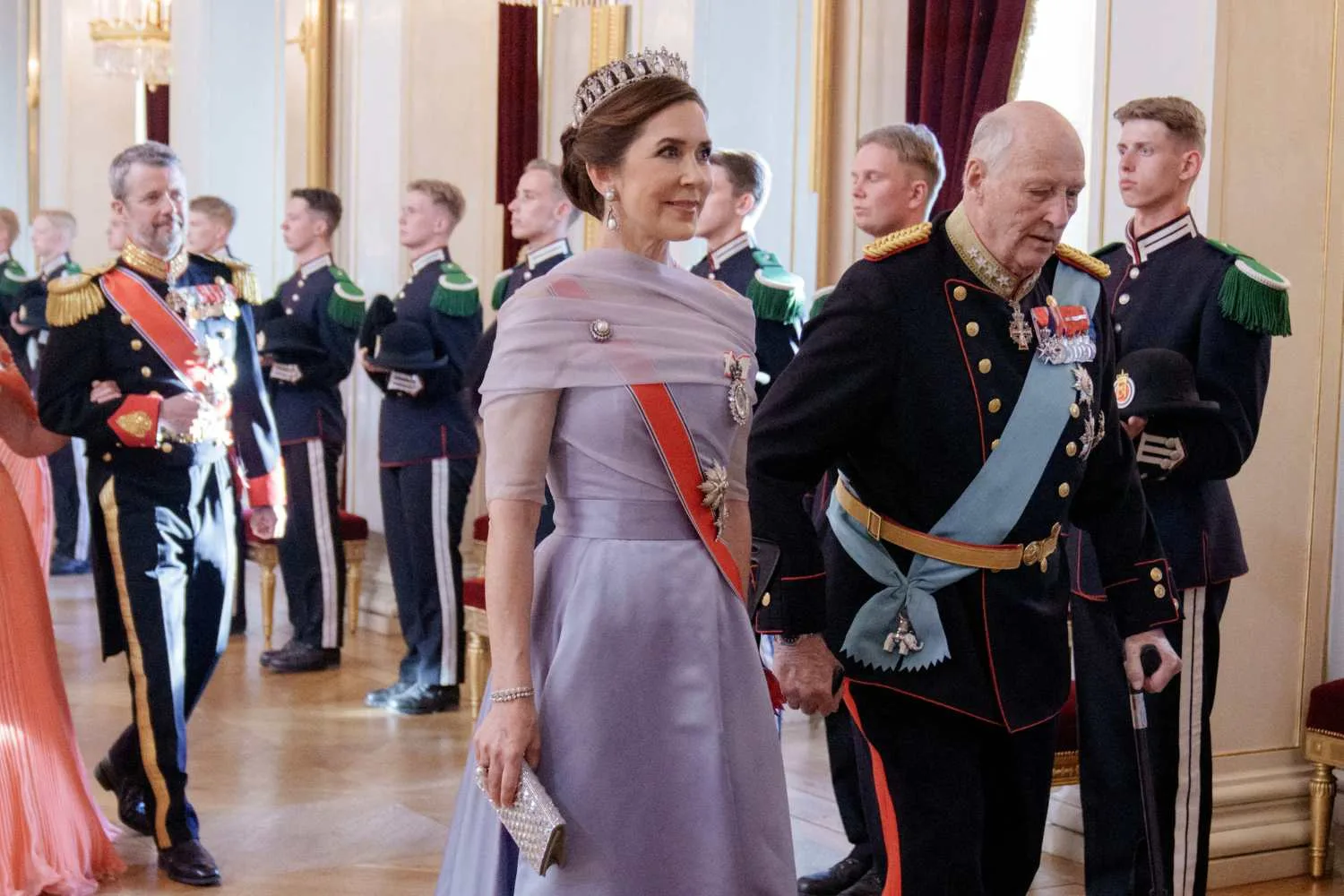 Queen Mary in purple dress