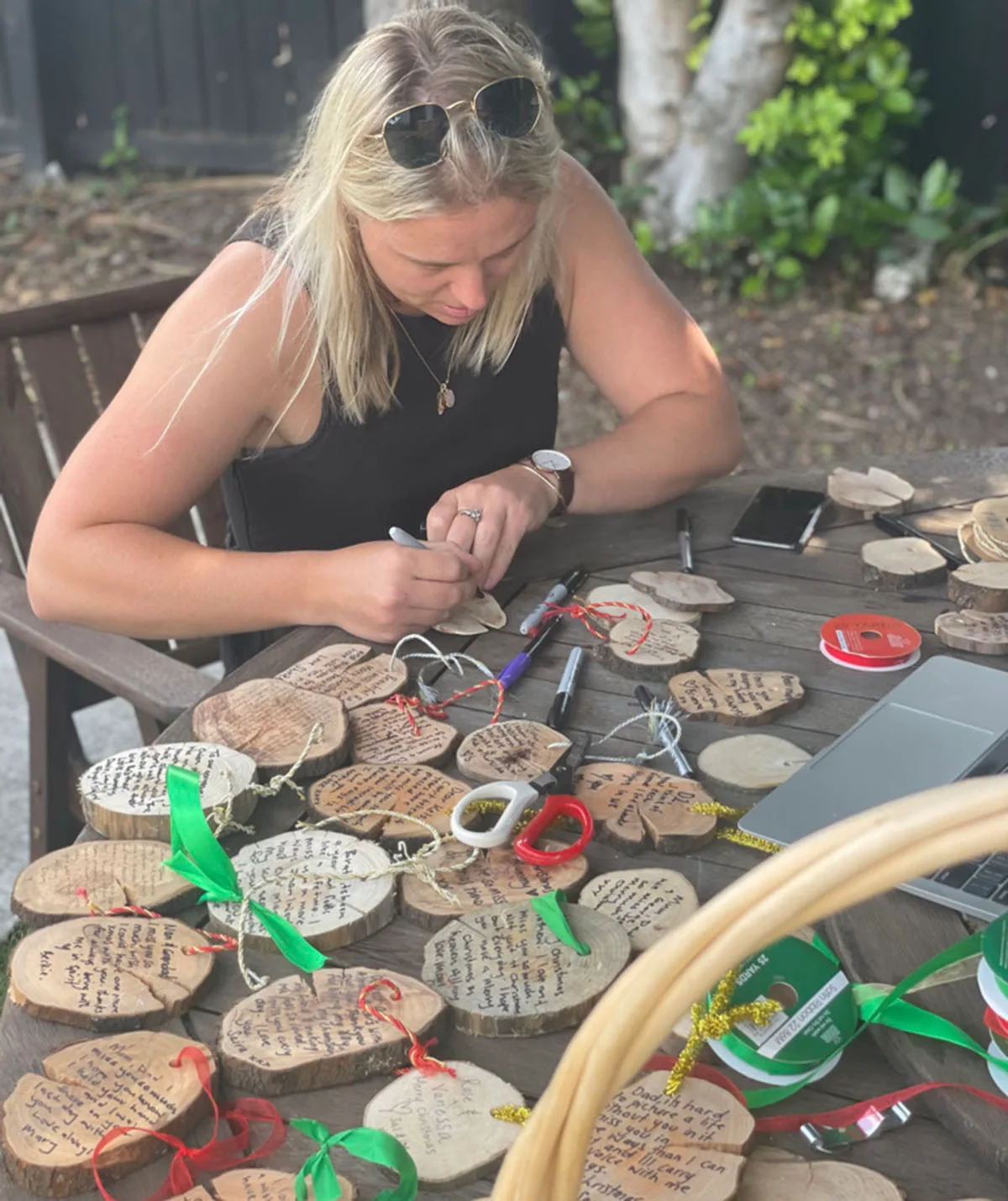 Sarah Robb making her special wooden decorations. (Image: Supplied)