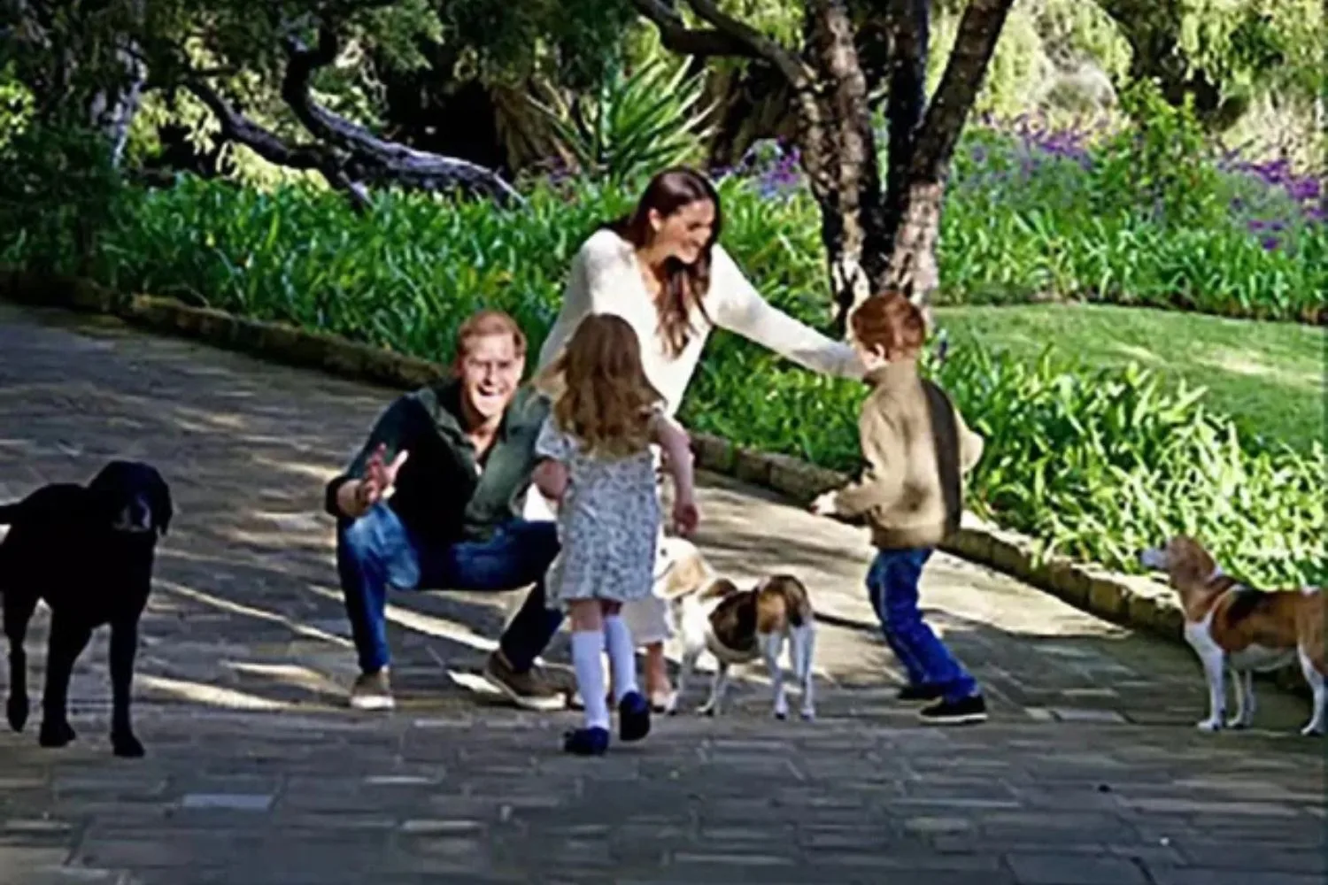 Prince Harry and Meghan with Archie and Lilibet