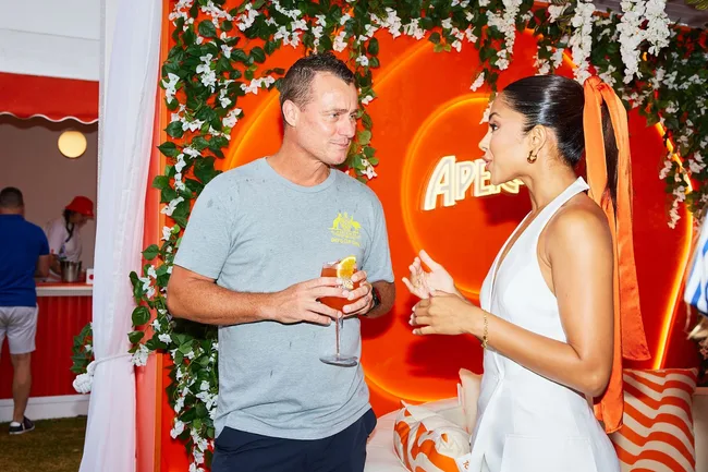 Lleyton Hewitt and Aperol spokesperson Maria Thattil