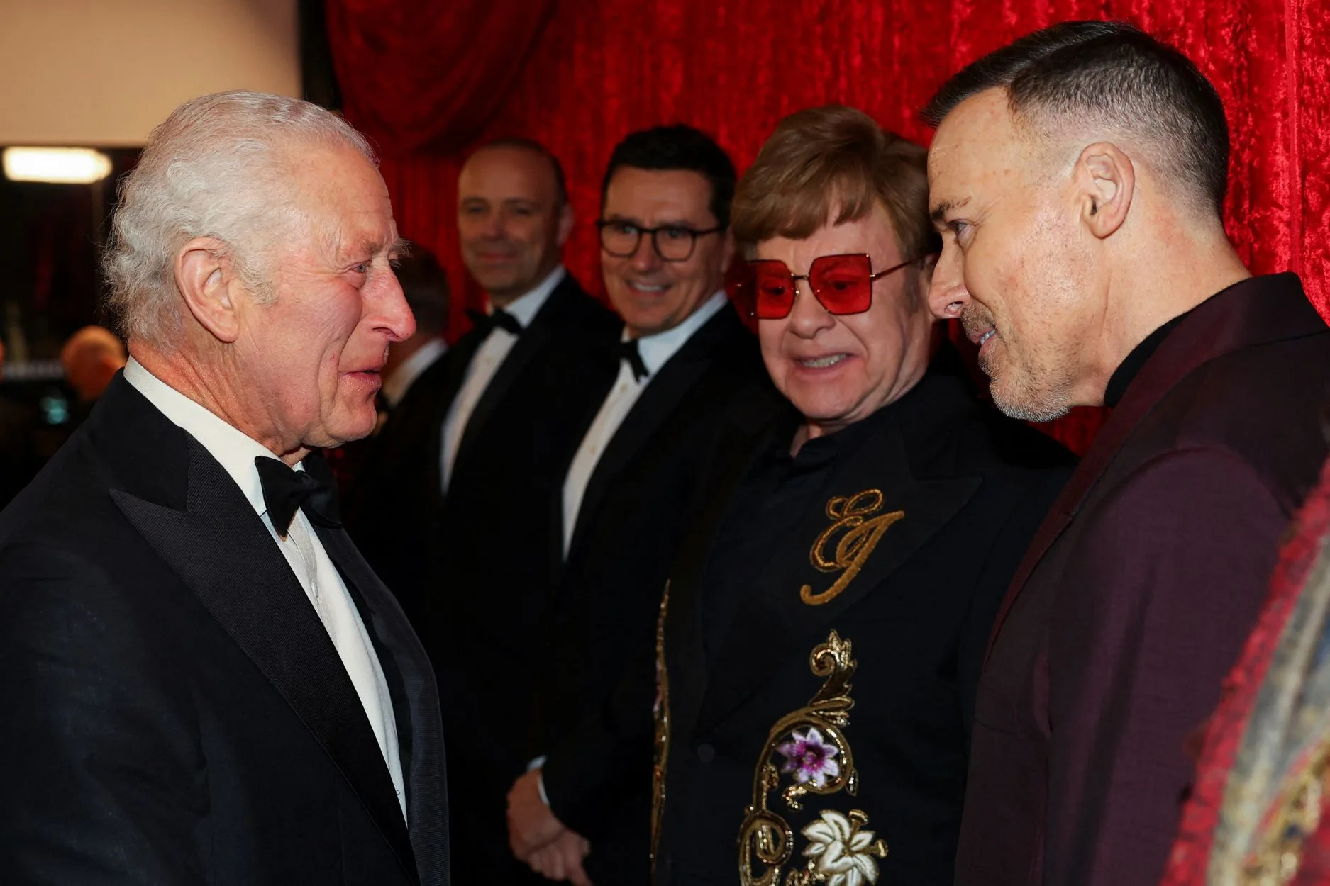 David Furnish and Elton John with King Charles 