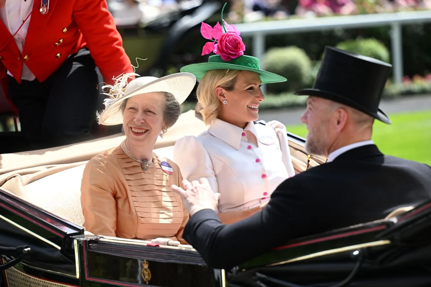 Zara and mike tindall with princess anne in a carriage