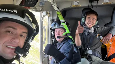 Hadi Nazari and the Polair rescuers who saved him.