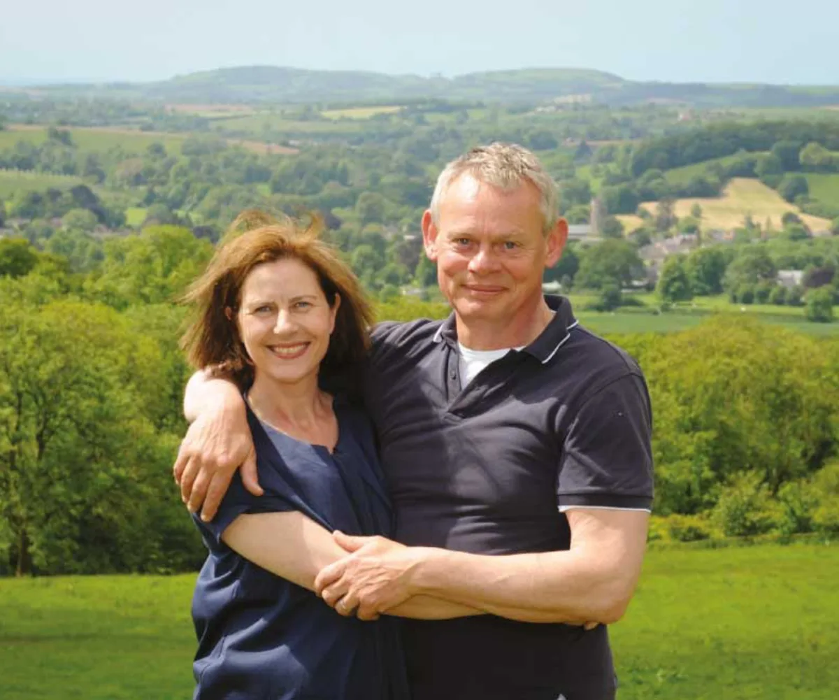 Martin and his wife on their farm