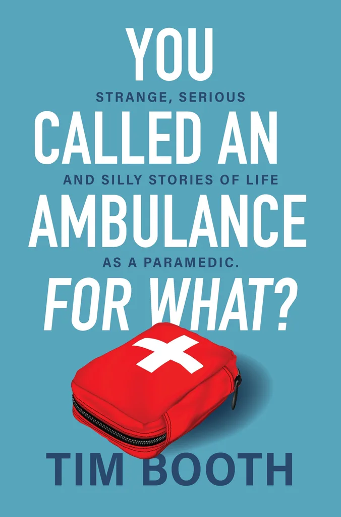 Blue cover over of Tim's book with title 'you called an ambulance for what?' on it and a picture of red first aid kit