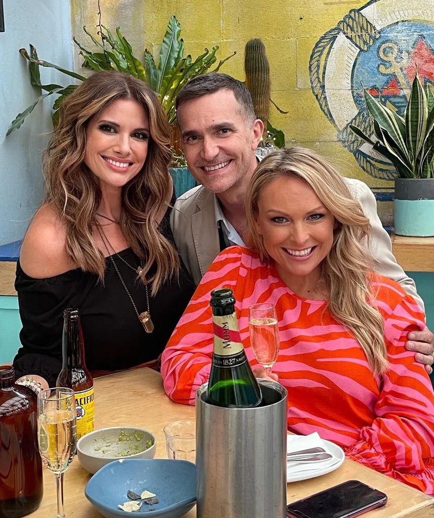 Mel poses with fellow marriage experts Alessandra Rampollo and John Aiken