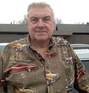 Ken outdoors wearing beige shirt with red and yellow retro cars on it