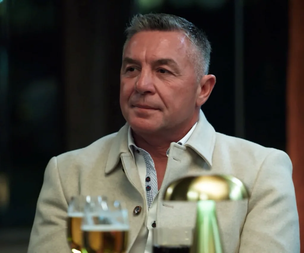 Tony sits looking unimpressed in a scene from Married At First Sight