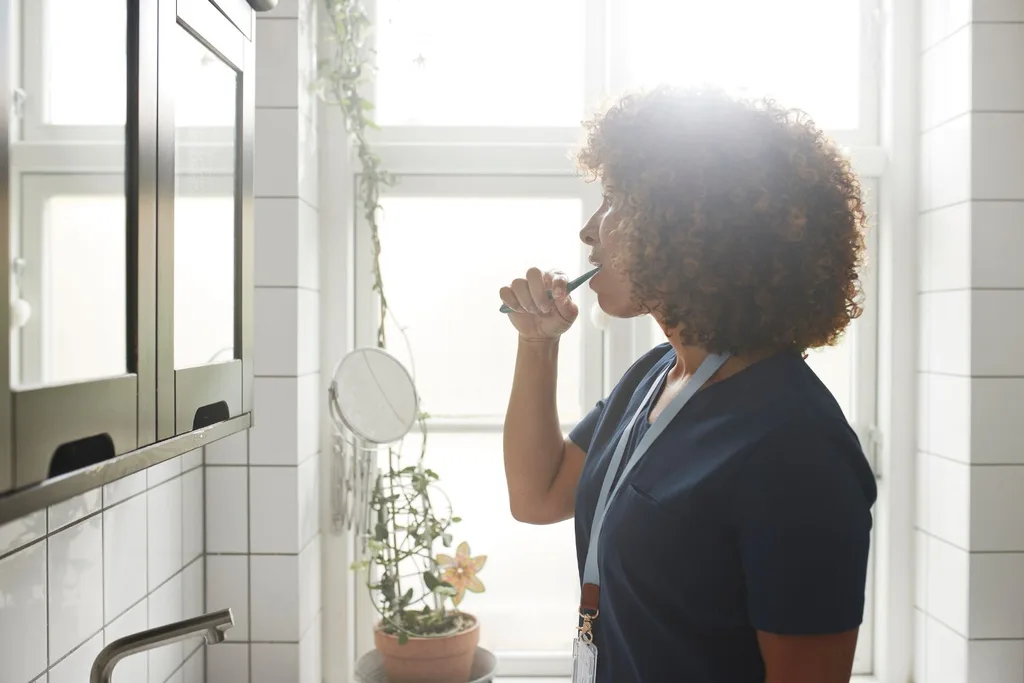 woman brushing teeth