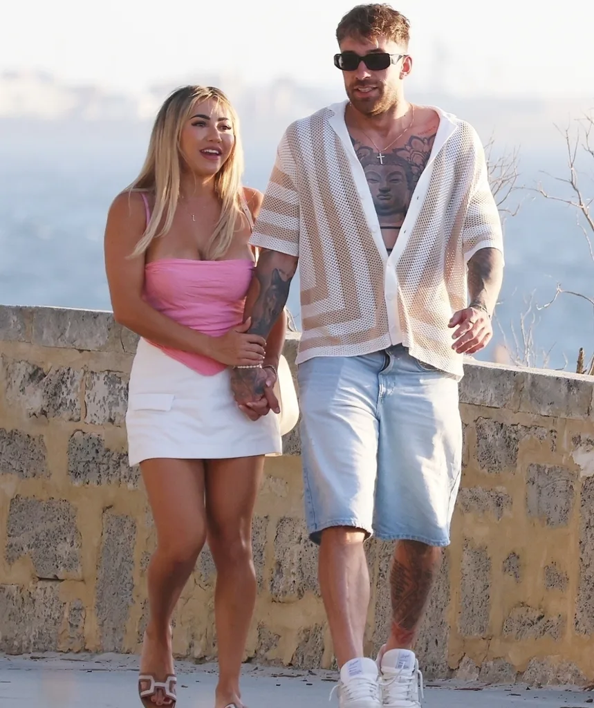 Awhina and Billy were seen walking hand in hand along the beach in Perth last Wednesday.