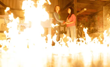 Nicolette and Sadie are caught up in a warehouse fire with flames surrounding them