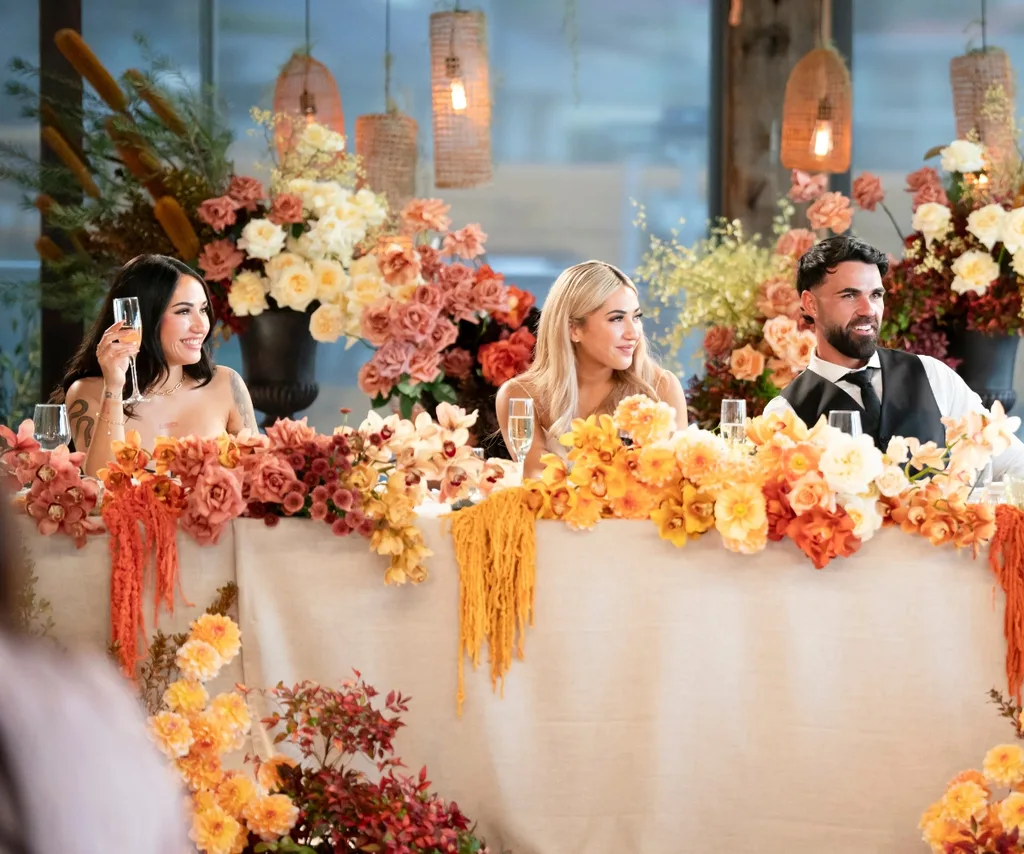 Cleo sits with sister Awhina and Adrian at their MAFS wedding