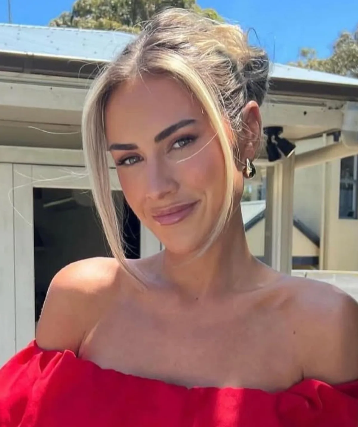 Dave's ex-fiancee Steph poses in a red dress.