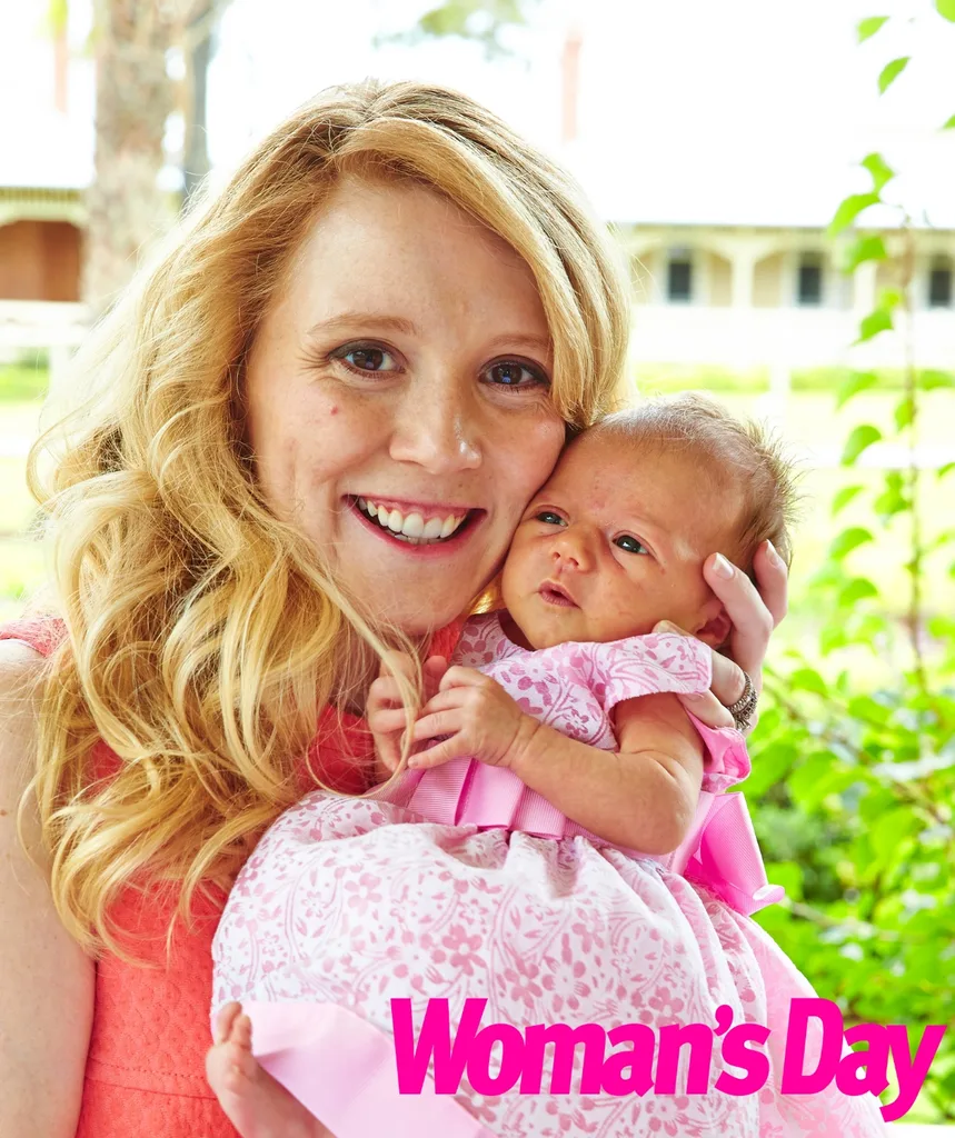 Nikki poses with Skylah as a baby in 2014