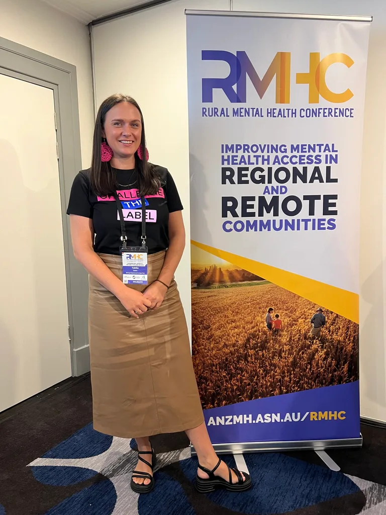 Tahlia, fresh and sober, working at the rural mental health conference