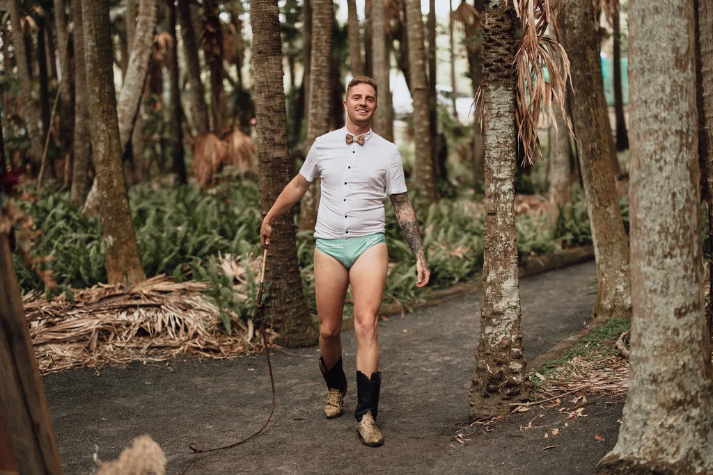 Monty Haron officiating a wedding in budgie smugglers
