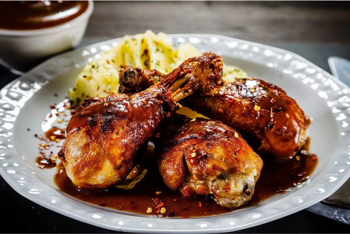 Chicken drumsticks. (Image: AdobeStock)