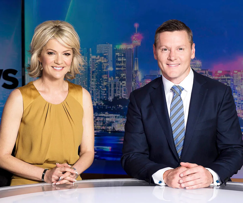 Sandra Sully and Matt Burke sit behind the Ten newsdesk.