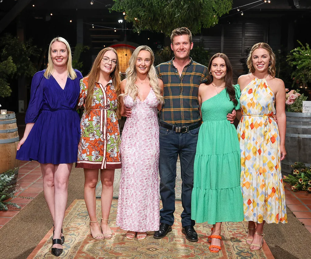 Farmer Tom, at the speed dating, standing with the five ladies he's chosen to take back to his farm: Bridget, Emma, Emmie-Rose, Eliza and Georgie.