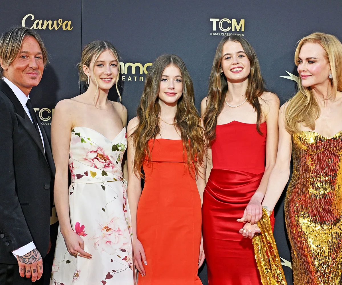 HOLLYWOOD, CALIFORNIA - APRIL 27: (L-R) Keith Urban, Sunday Rose Kidman Urban, Faith Margaret Kidman Urban, Sybella Hawley, and Nicole Kidman attend the 49th AFI Life Achievement Award Gala Tribute Celebrating Nicole Kidman at Dolby Theatre on April 27, 2024 in Hollywood, California. Keith wears a black suit with white shirt and the girls are all wearing stunning strapless gowns.