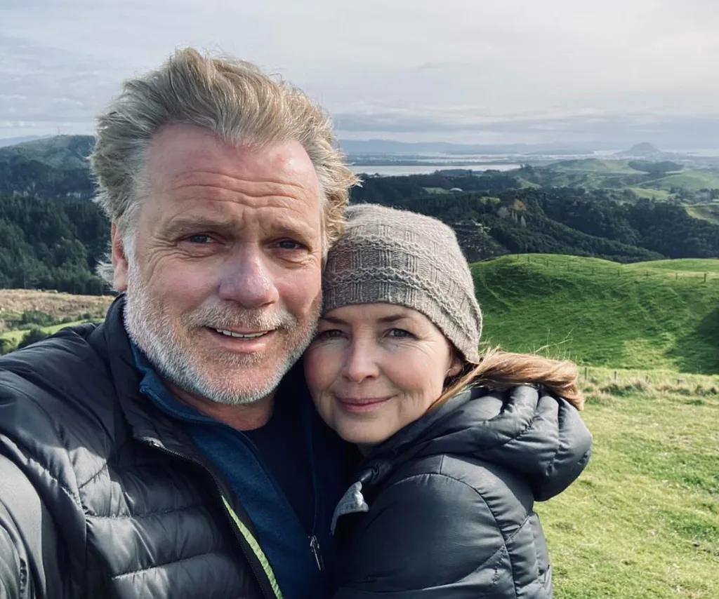 A middle aged man and woman.